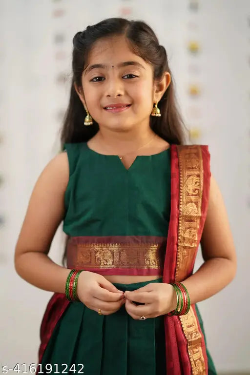 Art Silk unstitched kids lehenga choli, solid color with multiple size options for age range from 0-12 years old, traditional Indian clothing on display