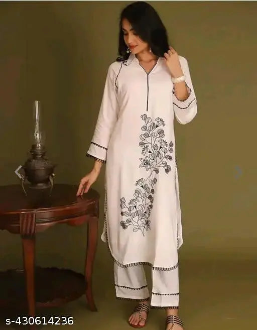Rayon Aakarsha Pretty Women's Kurta set with palazzos, three-quarter sleeves, printed net pattern, single size options M and XL