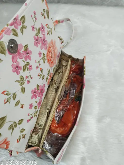 Gorgeous fashion siling bag with pink floral lining and zip closure