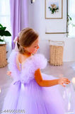 Purple satin dress with straps, sleeves, and a high neck