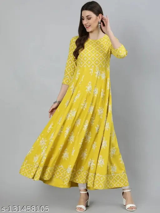 Yellow rayon Anarkali gown with dupatta featuring ethnic motifs, perfect for Indian women's fashion