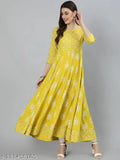 Yellow rayon Anarkali gown with dupatta featuring ethnic motifs, perfect for Indian women's fashion