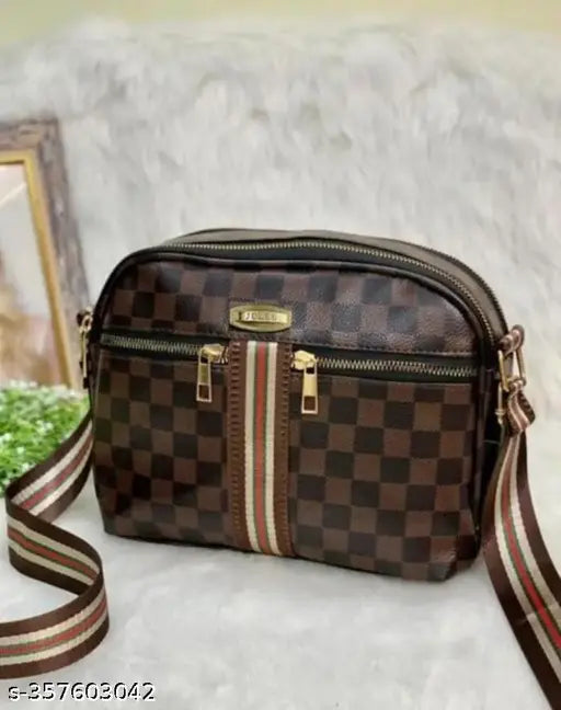 Dark brown Louis Vuitton sling bag, tan straps