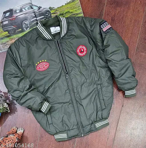 A child's green puffer coat with a flag patch on the left sleeve, winter jacket
