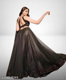 Velvet and net Lehenga Choli with sequins work, embellished topwear and solid dupatta on model