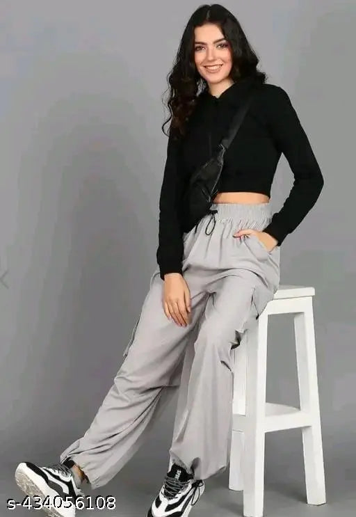 Grey NSCARGOWOMEN sweatpants with black trim and side pockets