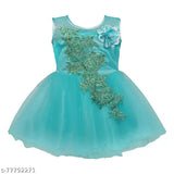 Teal frock with silver floral embroidery and a teal flower accent, designed for baby girls