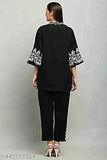 Gorgeous look black coord set with heavy embroidery for women. Viscose rayon kurta and palazzos, three-quarter sleeves. Single size options available