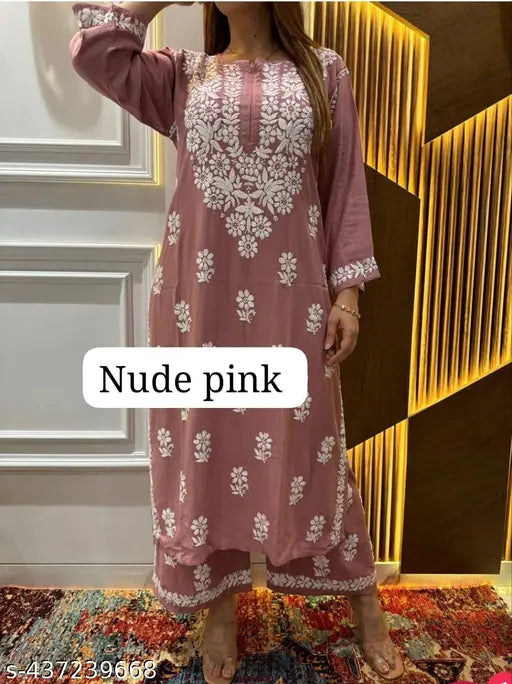 Rayon chikankari embroidery kurta with plazzo set, full-length three-quarter sleeves, printed net pattern, Indian handcrafted clothing on display stand