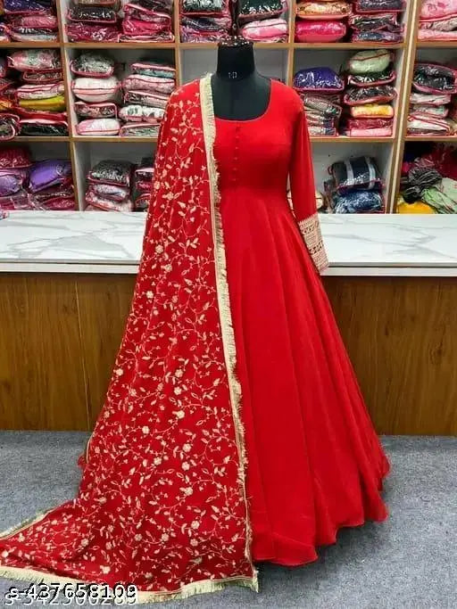 Red embroidered kurta with matching pallu
