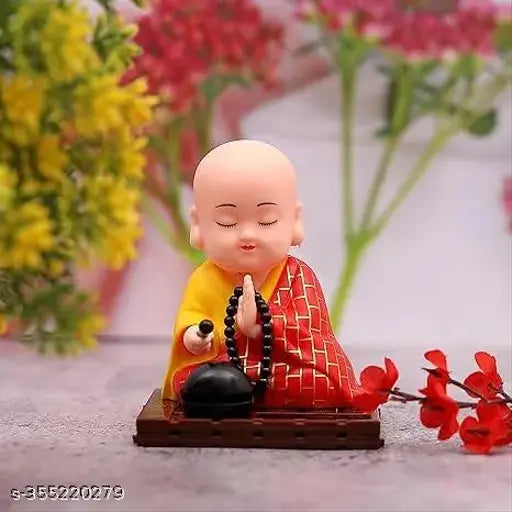 Multi-colored solar-powered Chinese Little Buddha Monk figurine, eco-friendly automobile showpiece with moving head and ringing drum