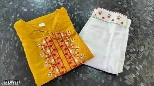 Rayon kurta and palazzo set, embroidered net design, three-quarter sleeves, Indian ethnic wear on display