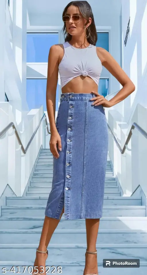 High-waist solid denim skirt, India-made, offers stretch for comfort and style with side button opening and adjustable slits