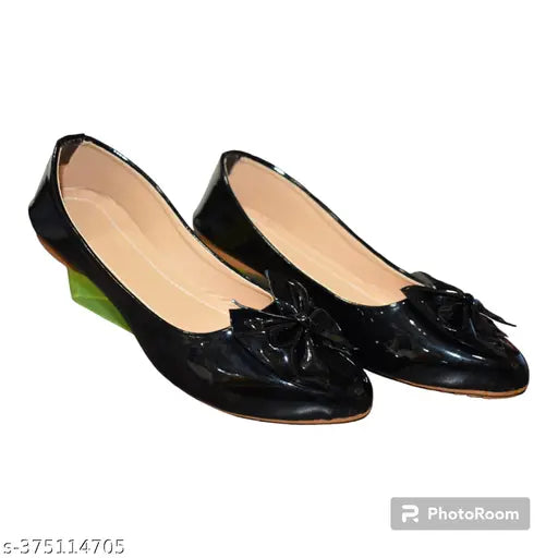Black synthetic leather slip-on sandals: Stylish Women Fancy Butterfly Bally on flat surface