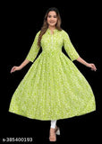 Green rayon printed Gaither Anarkali kurti set with pum-pom detail, three-quarter sleeves. Indian couture fashion for women