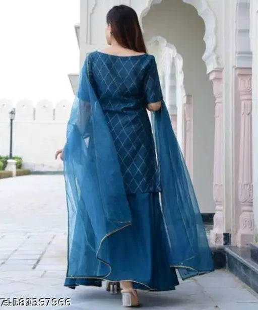 A model in a fashionable kurta, blue rayon fabric with embroidery detailing