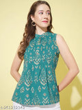 Blue rayon women's sleeveless top with S.blue ikat print, featuring stand collar & button closure. Made by The Fab Factory, origin India