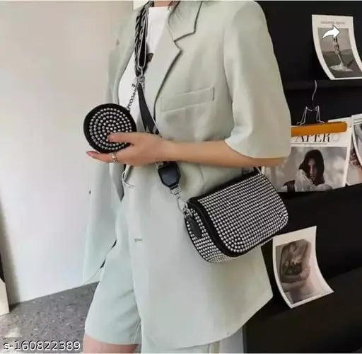 Stylish women's crossbody sling bag, black polka dot design, adjustable strap, medium size