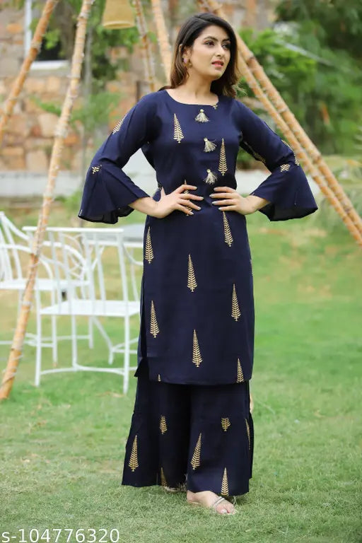 Dark blue rayon kameez with gold print, mid-length sleeves, long hemline, and elasticized waistband