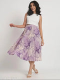 Elegant print midi skirt with flared hem and side pockets, perfect for casual or dressy occasions