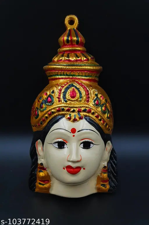 Brass Varalakshmi skin-colored god idol for pooja, intricately detailed Indian religious figure on altar