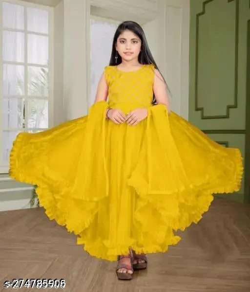 Embroidered net kids gowns, perfect for parties and festivals. Indian Lehenga Choli for girls, available in various colors. Sizes range from 4-16 years. Made in India