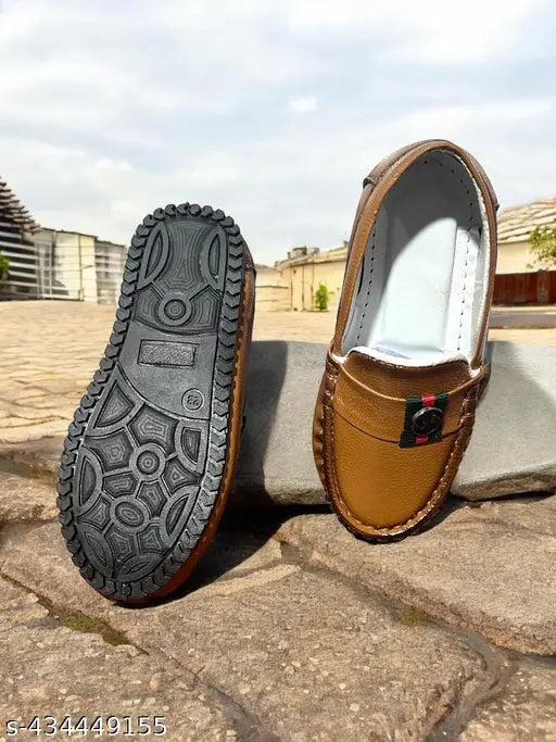 Brown suede loafer, black soles