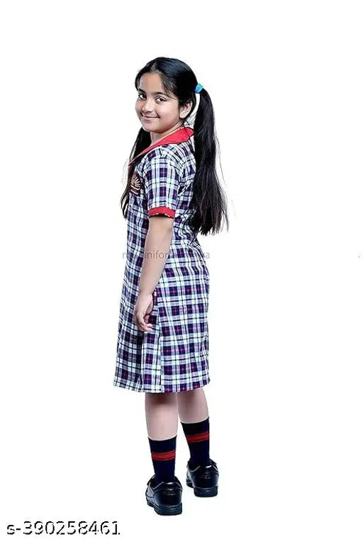 Girl in school uniform, white dress with black collar, blue tie
