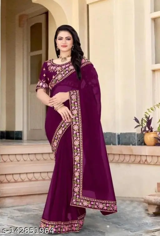 Purple embroidered saree with intricate designs, high neck, and pallu