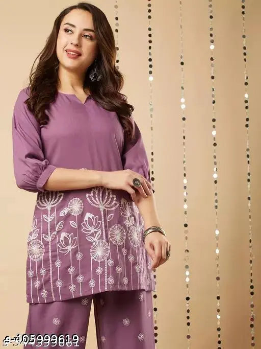 Embroidered net cotton blend kurta set with palazzos, three-quarter sleeves, available in sizes S-XXXL. Indian handcrafted fashion accessory
