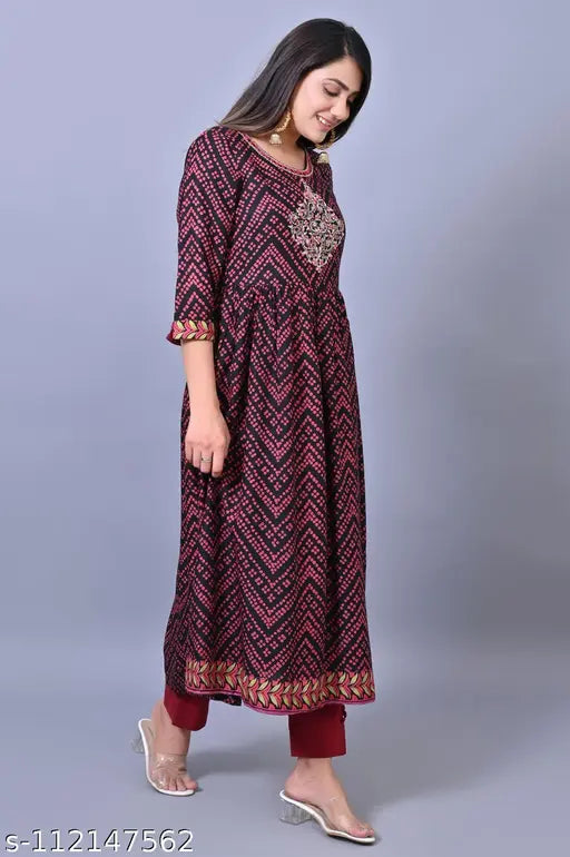 Embroidered straight kameez with red trim, knee length