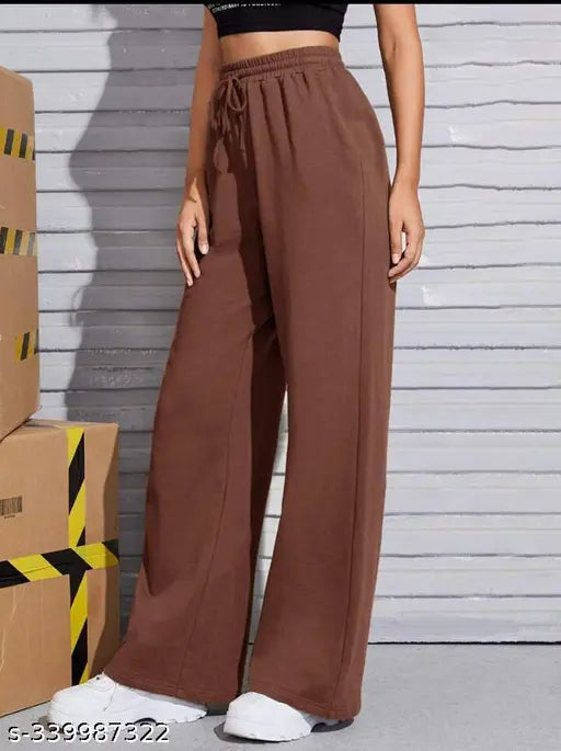 The image displays a pair of plain beige dori pants