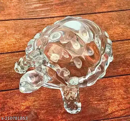 Clear crystal tortoise KACHHUA with leaf plate pond, enhancing career luck and adhering to Vastu principles. Perfect for home decor or gifting, 5.5 x 2 x 5.5 inches