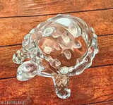 Clear crystal tortoise KACHHUA with leaf plate pond, enhancing career luck and adhering to Vastu principles. Perfect for home decor or gifting, 5.5 x 2 x 5.5 inches