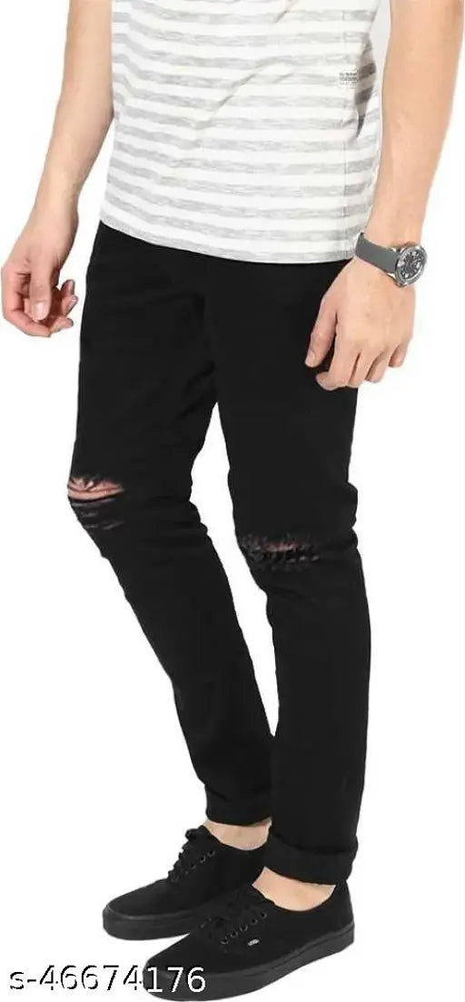 Black and white jeans with a distressed knee design