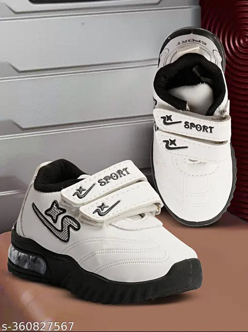 Adorable white kids' shoes with black branding, Velcro closure
