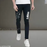 Black slim-fit jeans with a white graphic on the left thigh