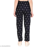 Trendy women's navy blue trackpants with white polka dots, lightweight and comfortable