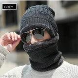 A dark grey knit cap and matching scarf set