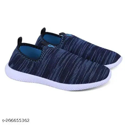 Stylish mesh and PVC women's sports sneakers in solid net pattern, closed back design. Available sizes: IND-4 to IND-8. Made in India
