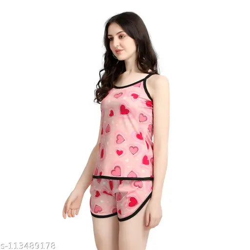 Baby pink cotton blend spaghetti top and short set, multicolor printed nightwear combo for women, stylish sleepwear on display