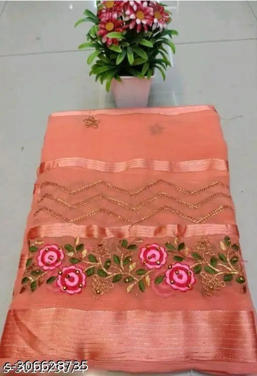 Red and gold embroidery on a georgette saree