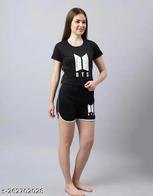 Black cotton blend BTS night suit with printed net pattern, featuring short sleeve t-shirt and shorts. Available in XS, S, M, L, XL sizes. Made in India