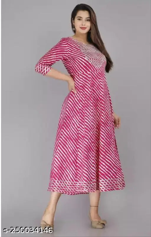 Pink Rayon Anarkali Kurta with Embroidery & Prints, Indian ethnic wear featuring sequins, beads, tassels, and side slits