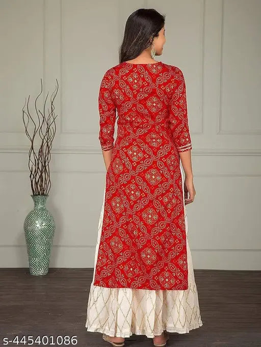 A vibrant red traditional embroidered kameez set with flared trousers, a modern fusion style