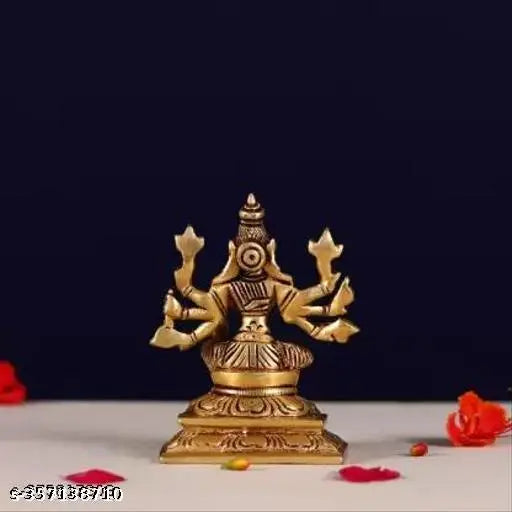 Small brass statue of Lord Vishnu's Varaha avatar with multiple arms