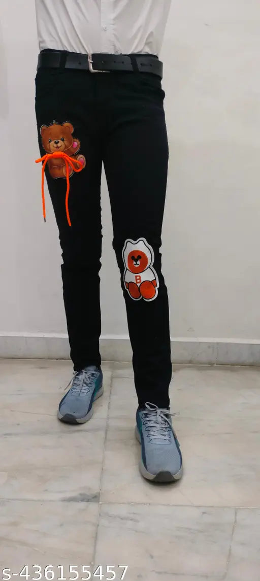 Men's black denim jeans with two teddy bear patches