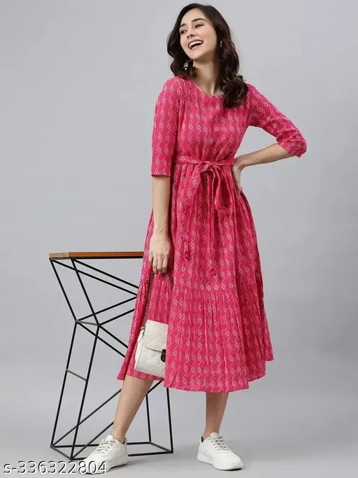 Woman in pink cotton midi dress with pockets