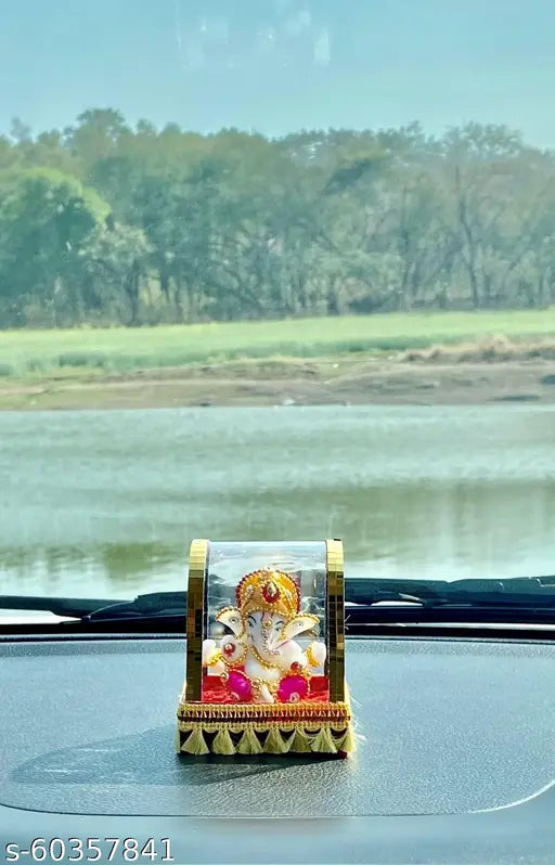 Multi-colored polyresin Lord Ganesha Idol for Home Decor, elegant and spiritual showpiece suitable for living room or car dashboard