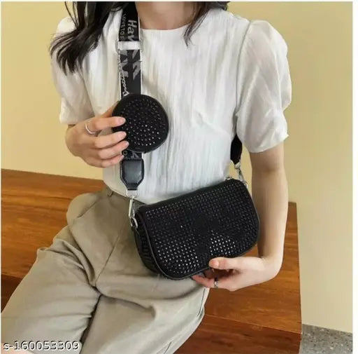 Black faux leather women's sling purse